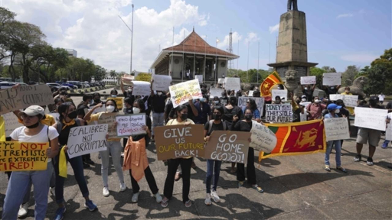 Sri Lankans protest demanding president Gotabaya Rajapaksa resign in Colombo. Pic/PTI